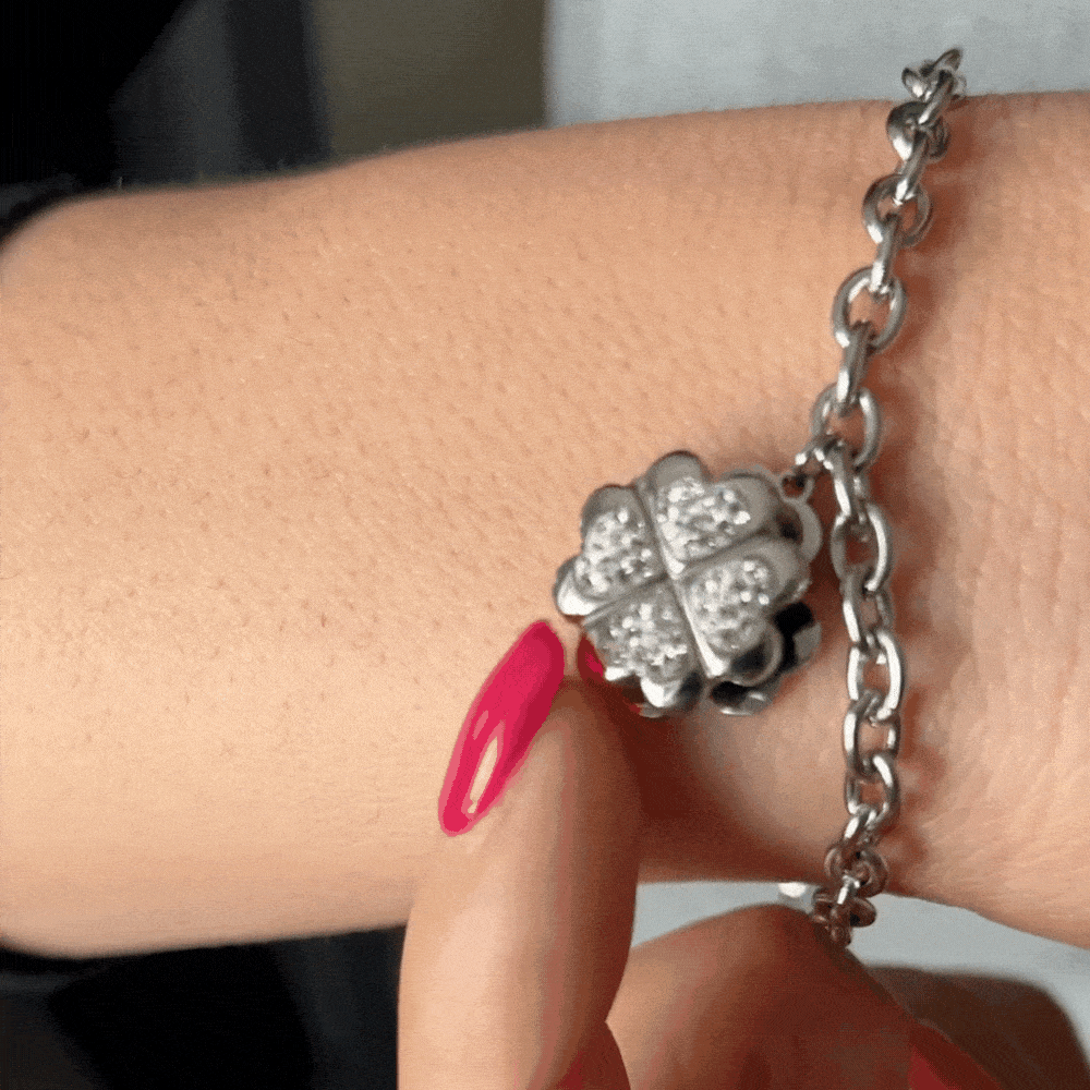 TRÉBOL DE CUATRO HOJAS BRAZALETE GIRATORIO DE ACERO PARA MUJER