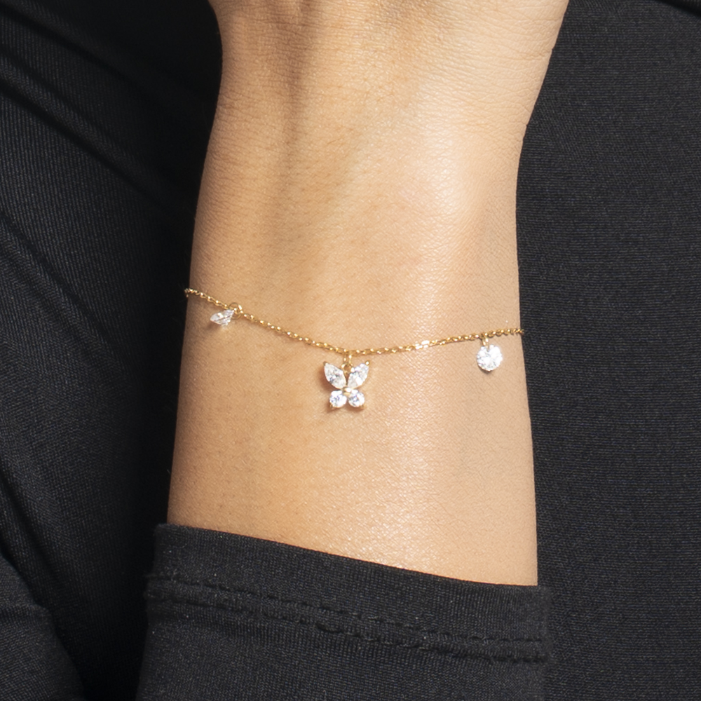 BRACCIALE DONNA IN ACCIAIO COLORE ORO CON PENDENTE FARFALLA ED ALI ZIRCONE BIANC