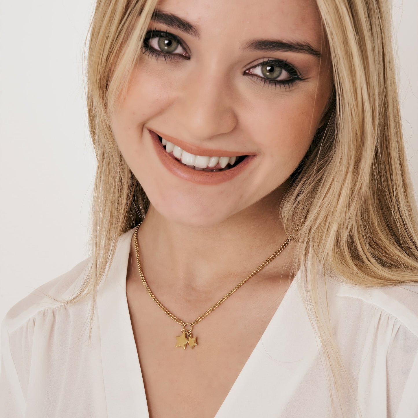 IP COLLAR DE ACERO DORADO PARA MUJER CON ESTRELLAS