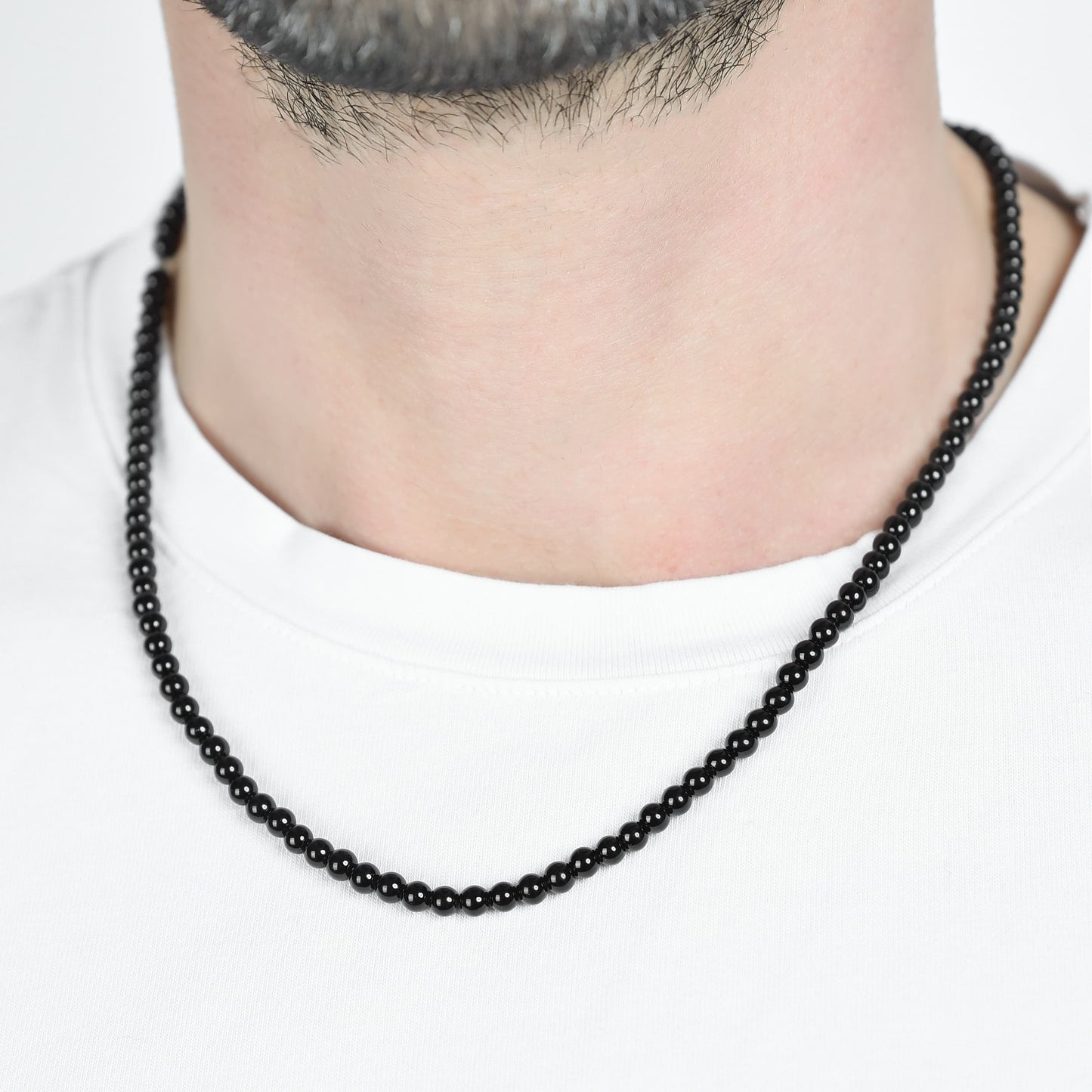 COLLAR DE HOMBRE DE ACERO CON PERLAS NEGRAS