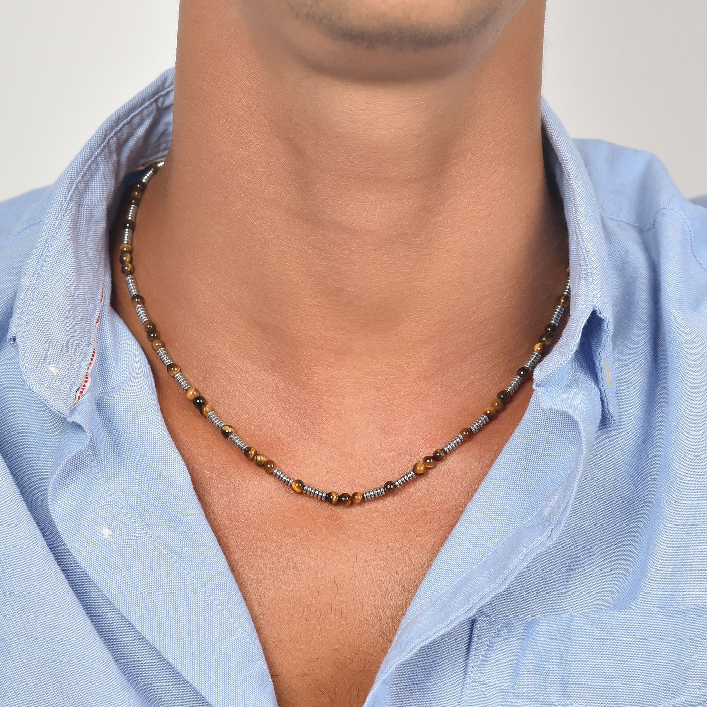 COLLAR DE ACERO PARA HOMBRE CON PIEDRAS DE OJO DE TIGRE Y ELEMENTOS DE ACERO