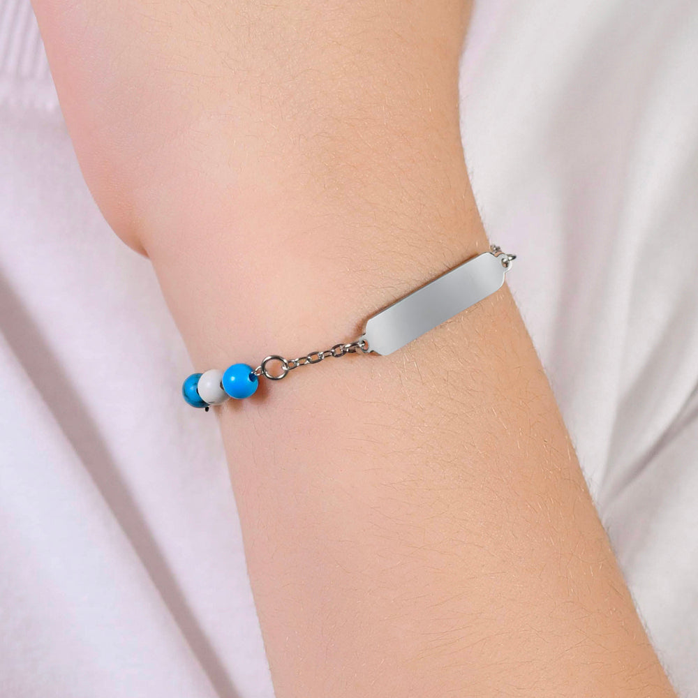 PULSERA DE ACERO PARA BEBÉ CON PIEDRAS AZULES Y BLANCAS