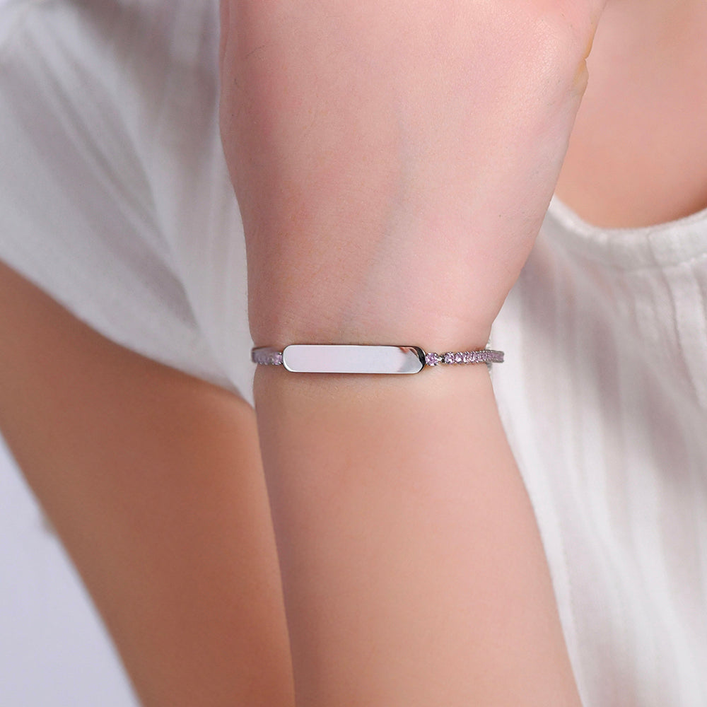 PULSERA DE TENIS DE NIÑA DE ACERO CON CRISTALES ROSAS Y PLACA