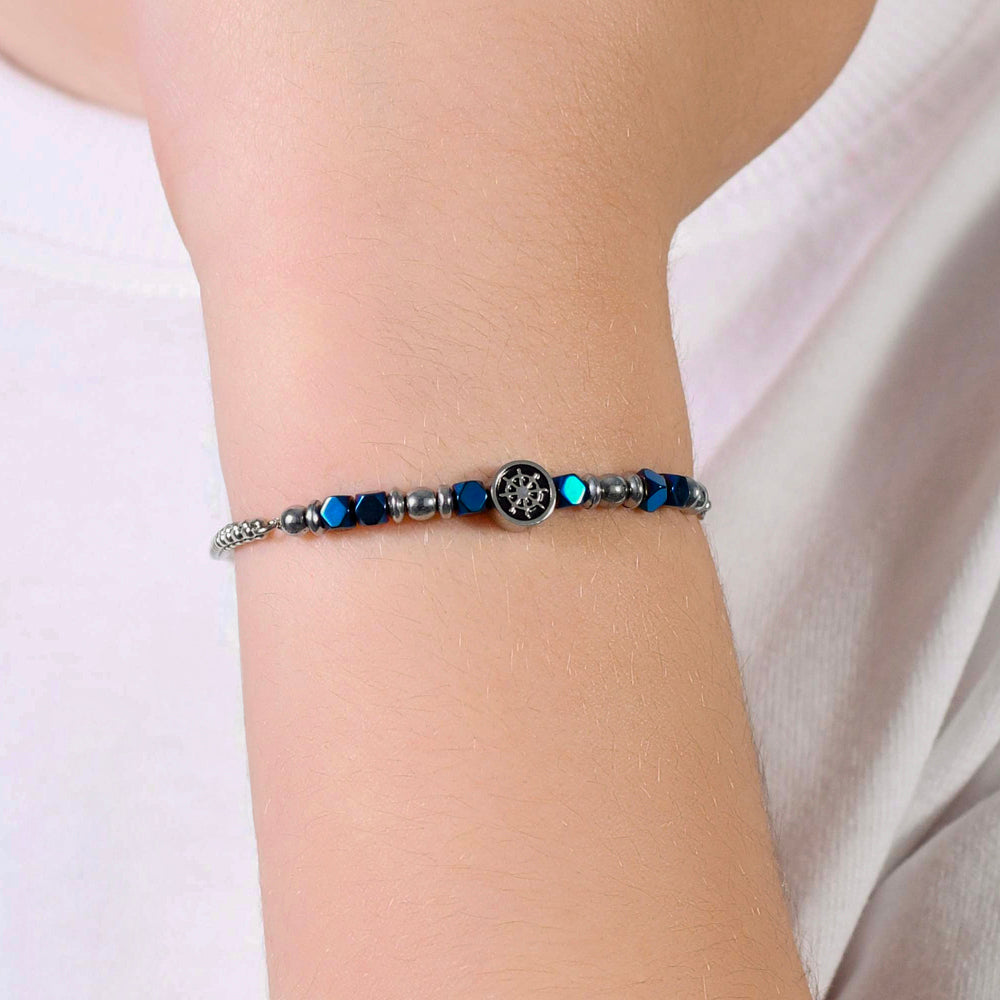 PULSERA DE ACERO PARA BEBÉ CON HEMATITES AZUL Y TIMÓN
