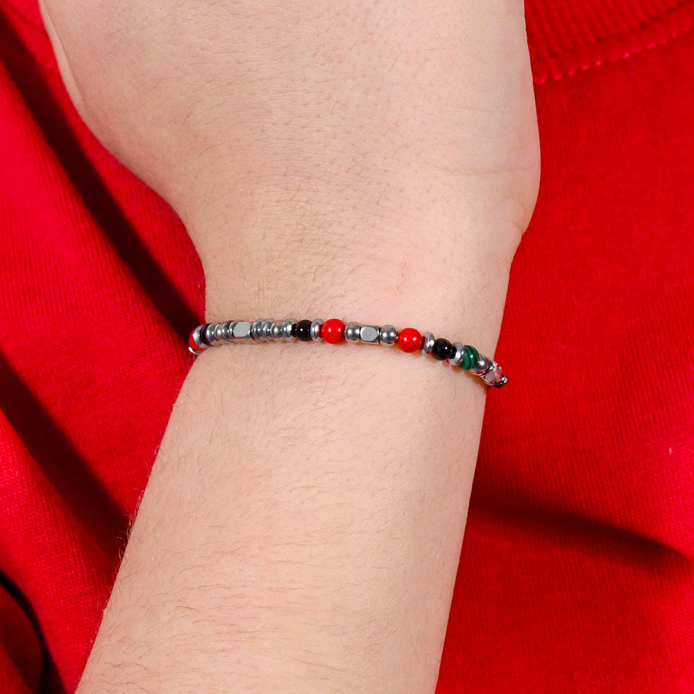 PULSERA DE ACERO PARA BEBÉ CON PIEDRAS MULTICOLORES