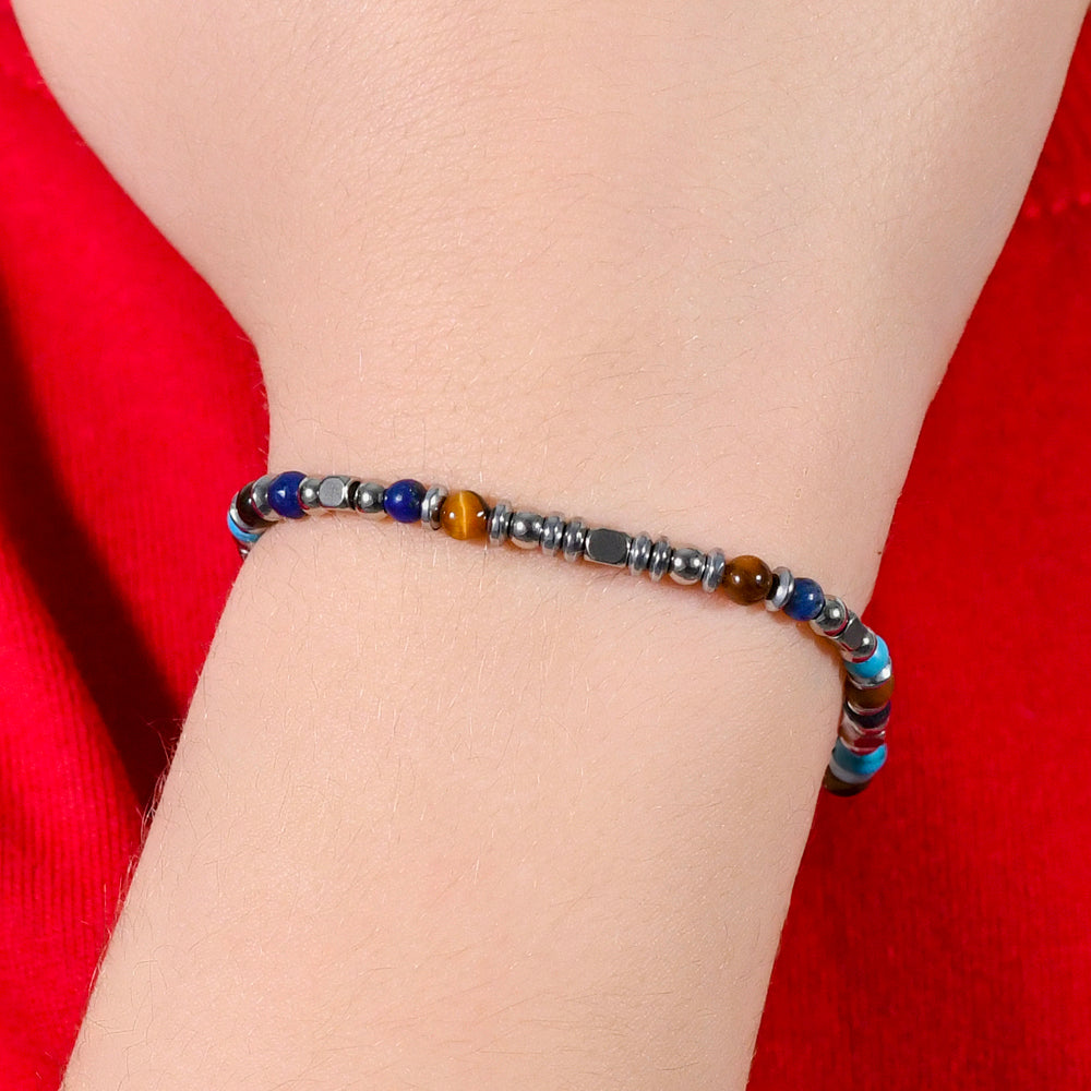PULSERA DE ACERO PARA BEBÉ CON PIEDRAS MULTICOLORES