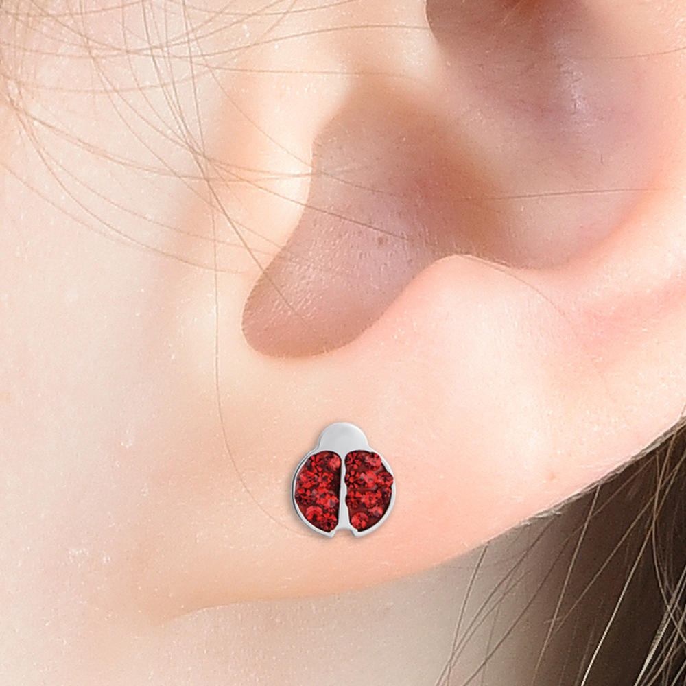 PENDIENTES DE NIÑA DE ACERO CON MARIQUITA Y CRISTALES ROJOS