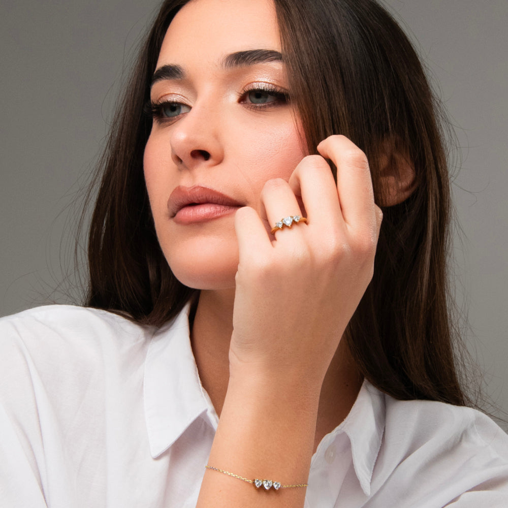 ANELLO DONNA IN ACCIAIO IP GOLD CON CUORI CON ZIRCONI BIANCHI