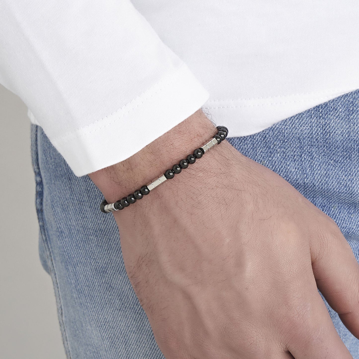 PULSERA DE ACERO PARA HOMBRE CON PIEDRAS NEGRAS Y ELEMENTOS DE ACERO