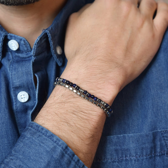 PULSERA DE ACERO PARA HOMBRE CON PIEDRAS AZULES Y ELEMENTOS DE ACERO