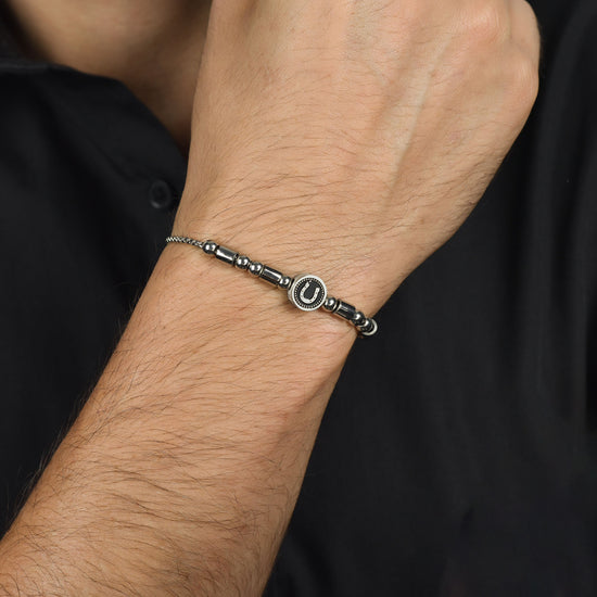 ELEMENTO DE PULSERA DE ACERO PARA HOMBRE CON HERRADURA DE PLATA Y ESMALTE NEGRO