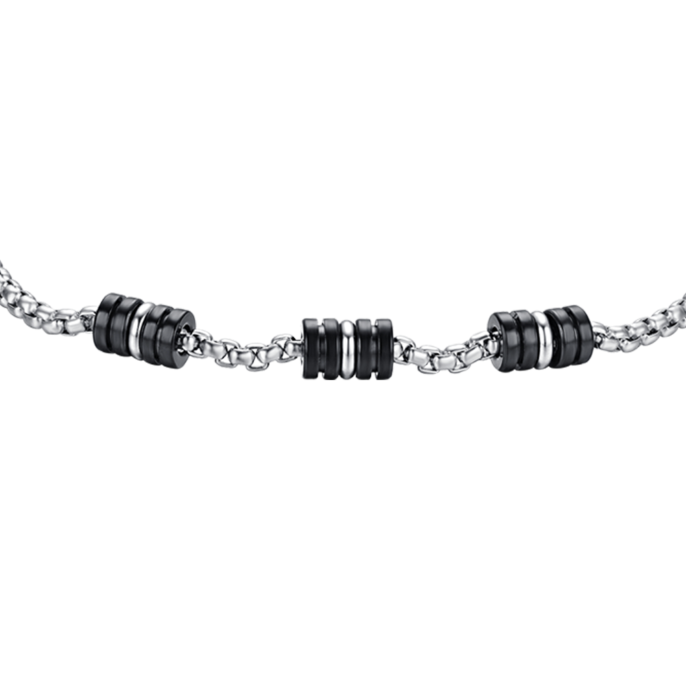 BRAZALETE DE ACERO PARA HOMBRE CON ELEMENTOS IP NEGROS Y PLATEADOS
