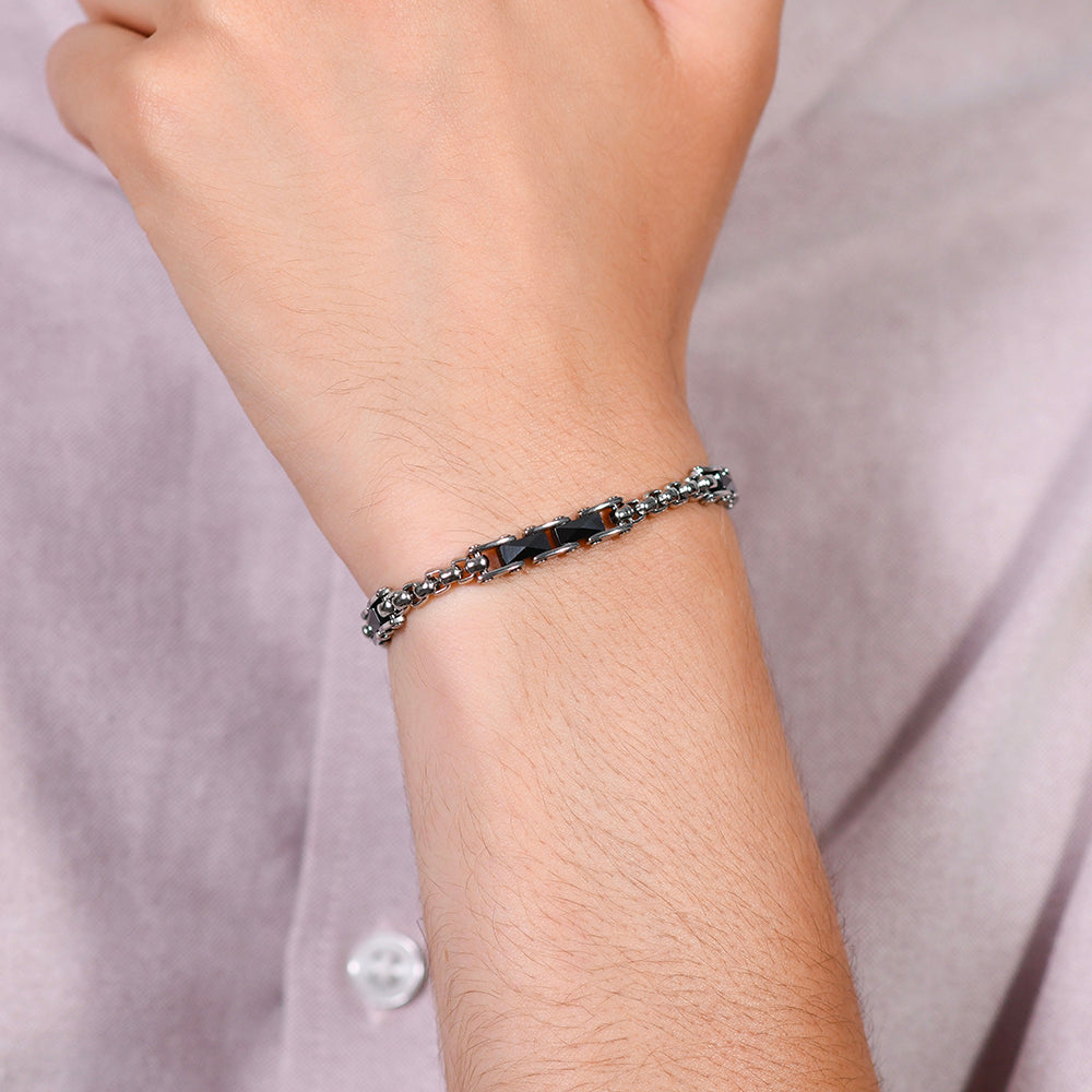 BRAZALETE DE HOMBRE DE ACERO CON ELEMENTOS DE CERÁMICA NEGRA