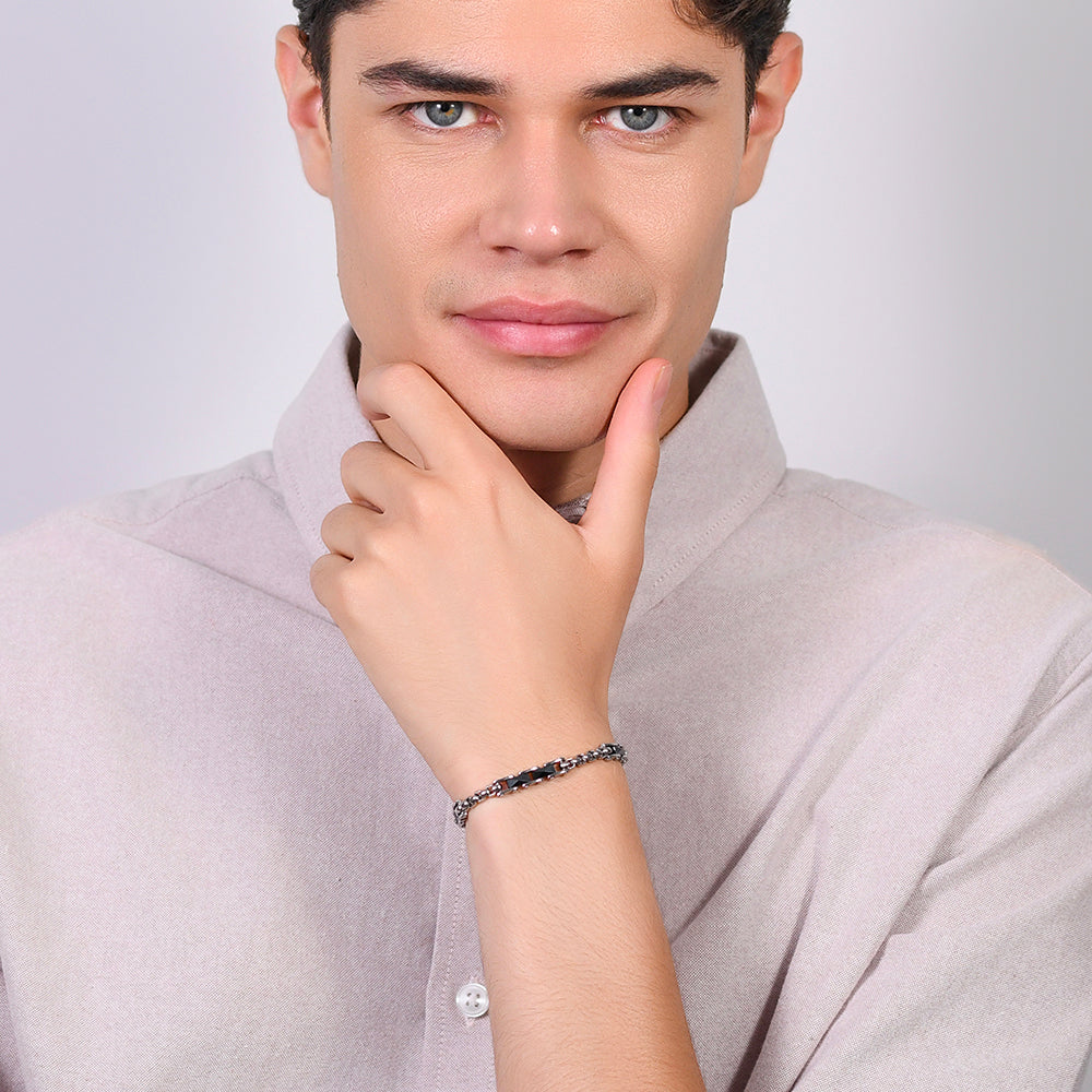 BRAZALETE DE HOMBRE DE ACERO CON ELEMENTOS DE CERÁMICA NEGRA