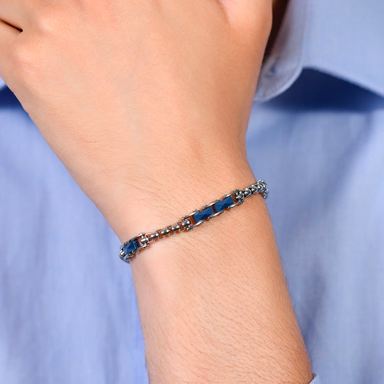 BRAZALETE DE ACERO PARA HOMBRE CON ELEMENTOS DE CERÁMICA AZUL