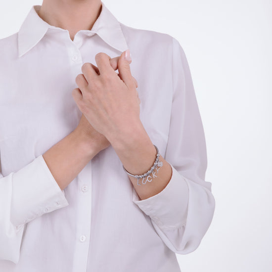 PULSERA DE ACERO CON AMULETOS DE LA SUERTE