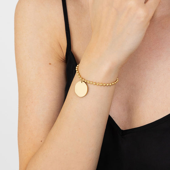 PULSERA PERSONALIZADA DE ACERO CHAPADO EN ORO PARA MUJER