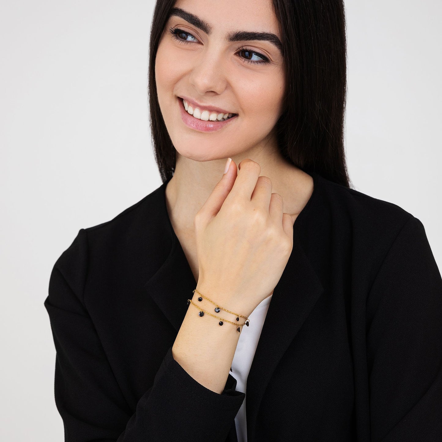 PULSERA DE ACERO DORADO PARA MUJER CON CRISTALES NEGROS