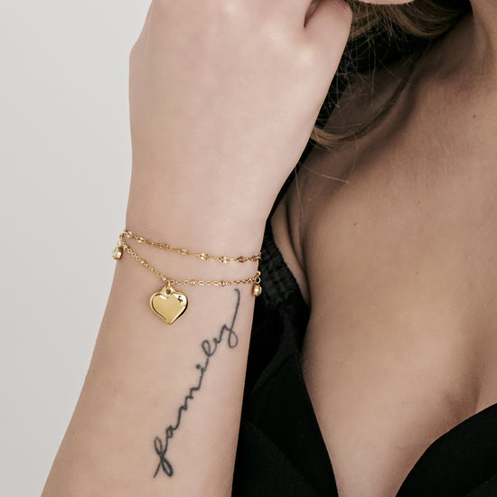 IP PULSERA DE ACERO DORADO PARA MUJER CON CORAZÓN Y CRISTALES BLANCOS