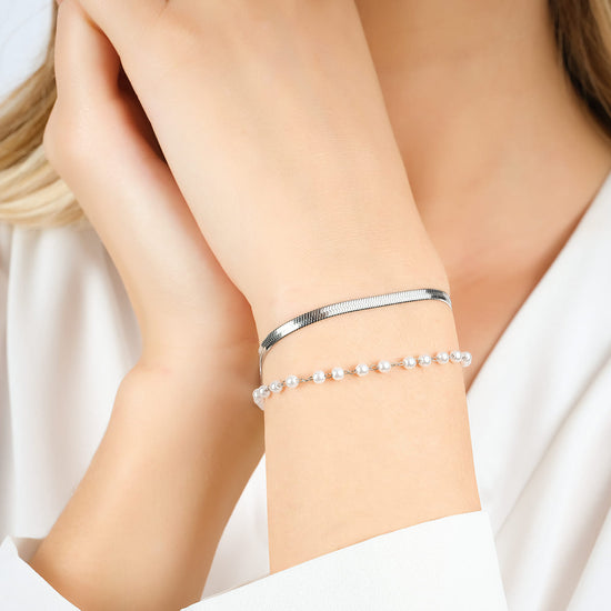 PULSERA DE ACERO PARA MUJER CON PERLAS BLANCAS