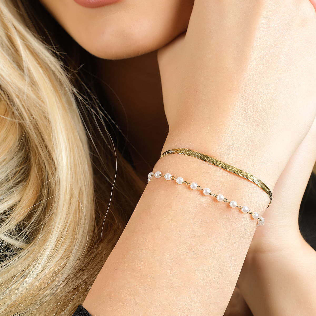 PULSERA DE ACERO PARA MUJER CON PERLAS BLANCAS