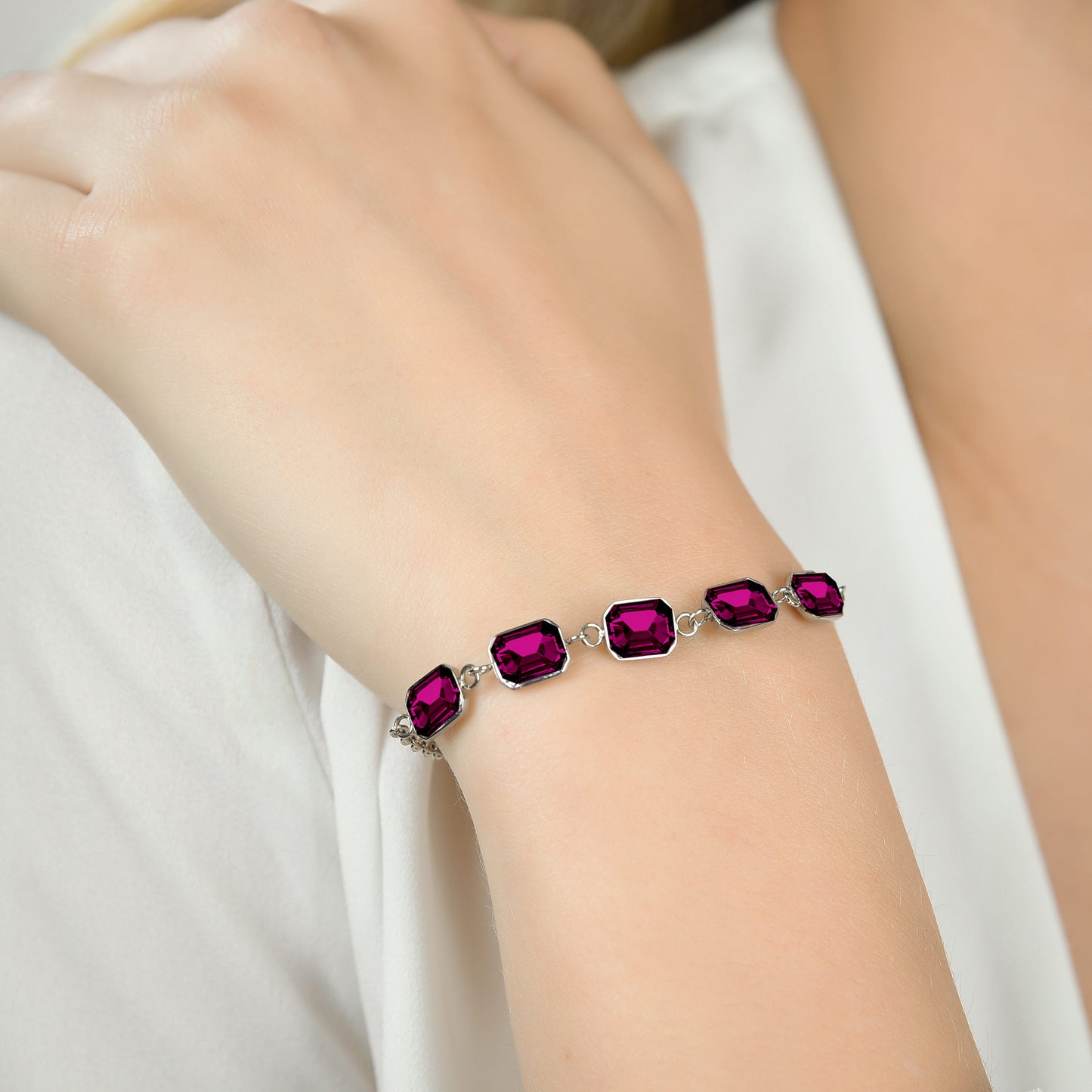 PULSERA DE ACERO PARA MUJER CON CRISTALES FUCSIA