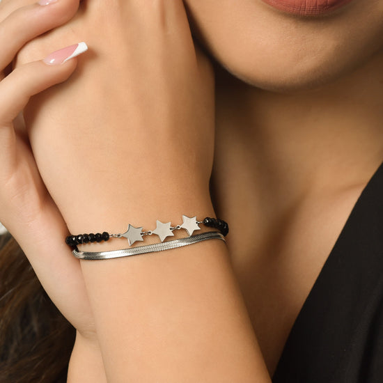 PULSERA MULTIFILAR DE ACERO PARA MUJER CON CRISTALES NEGROS Y ESTRELLAS