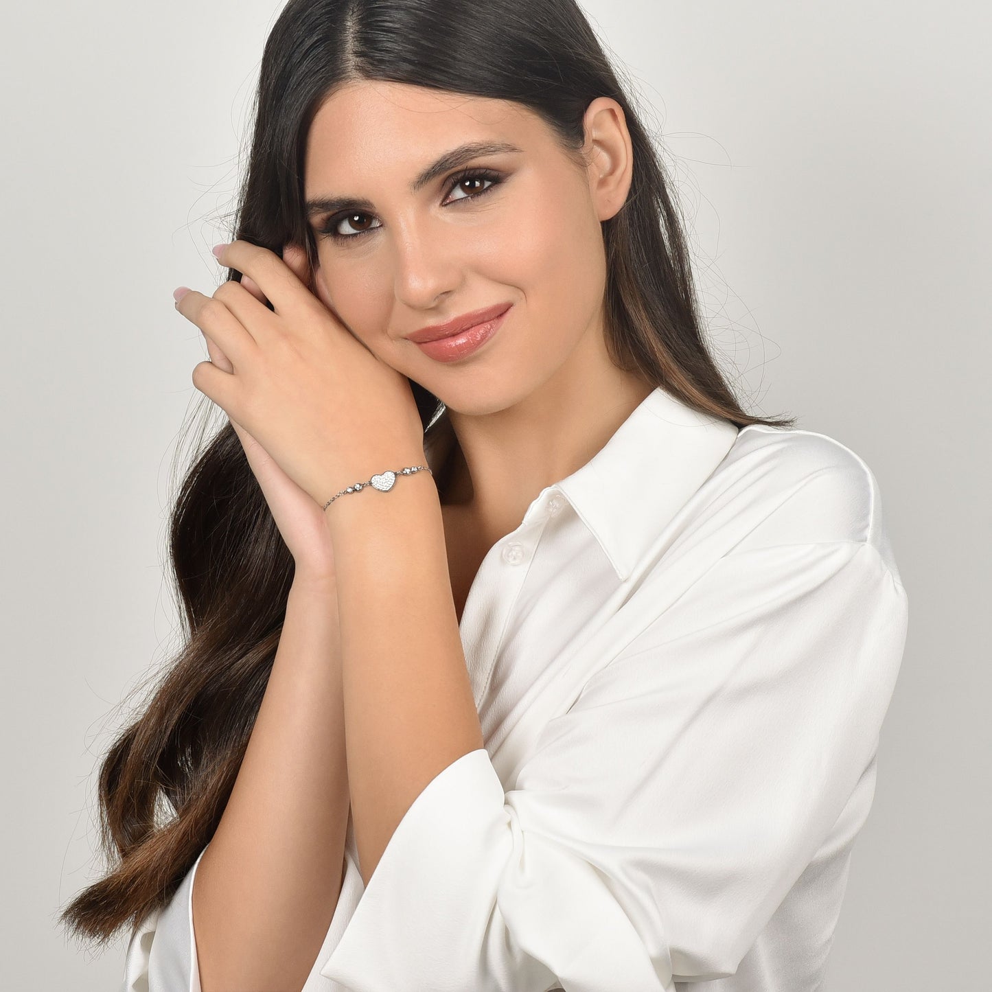 PULSERA DE ACERO DE MUJER CON CORAZÓN Y CRISTALES BLANCOS