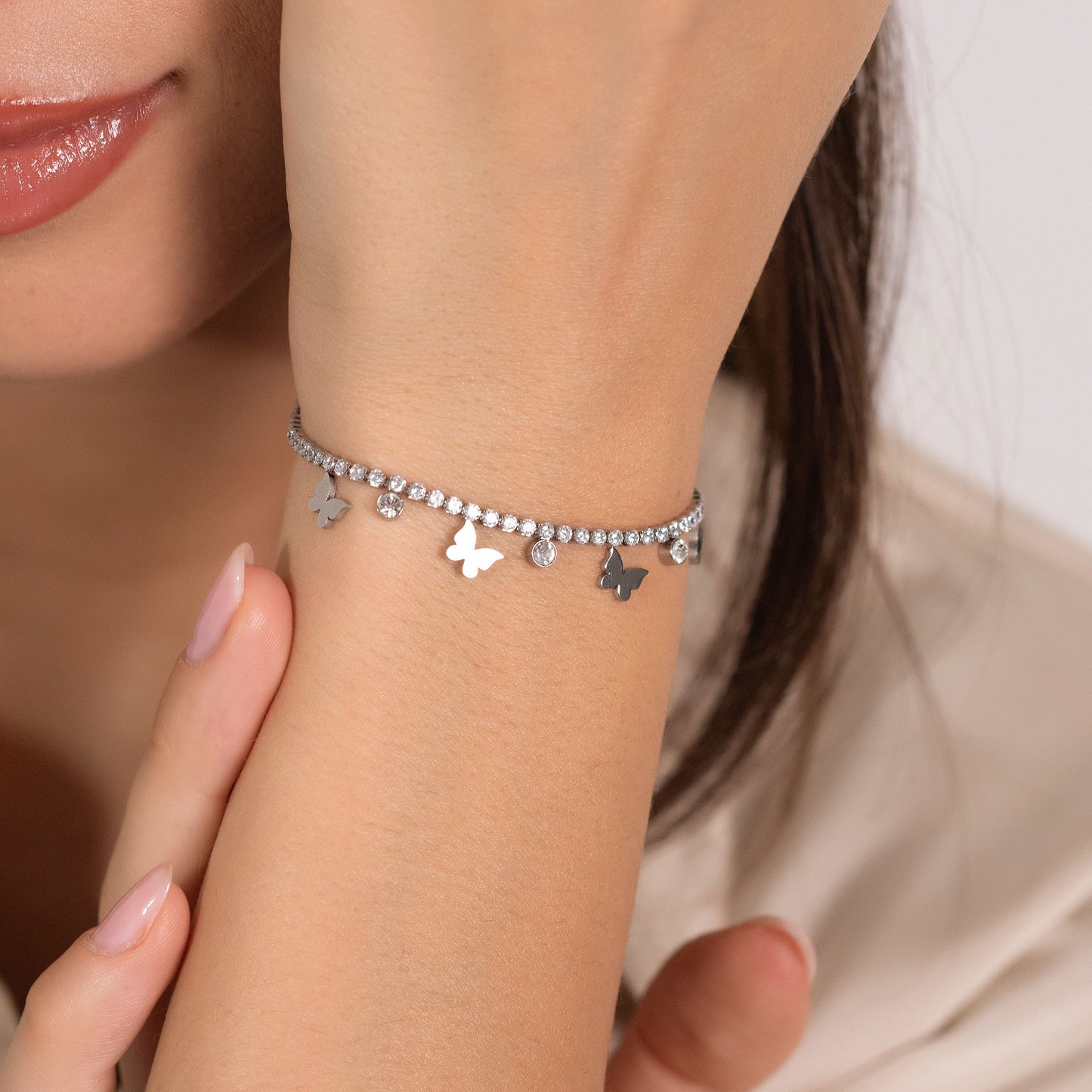 PULSERA DE TENIS DE ACERO PARA MUJER CON CRISTALES BLANCOS Y MARIPOSAS