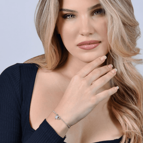 PULSERA DE ACERO PARA MUJER CON ESTRELLA Y CIRCONITA ROSA