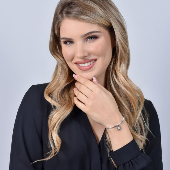 PULSERA DE ACERO PARA MUJER CON PERLAS Y SOL