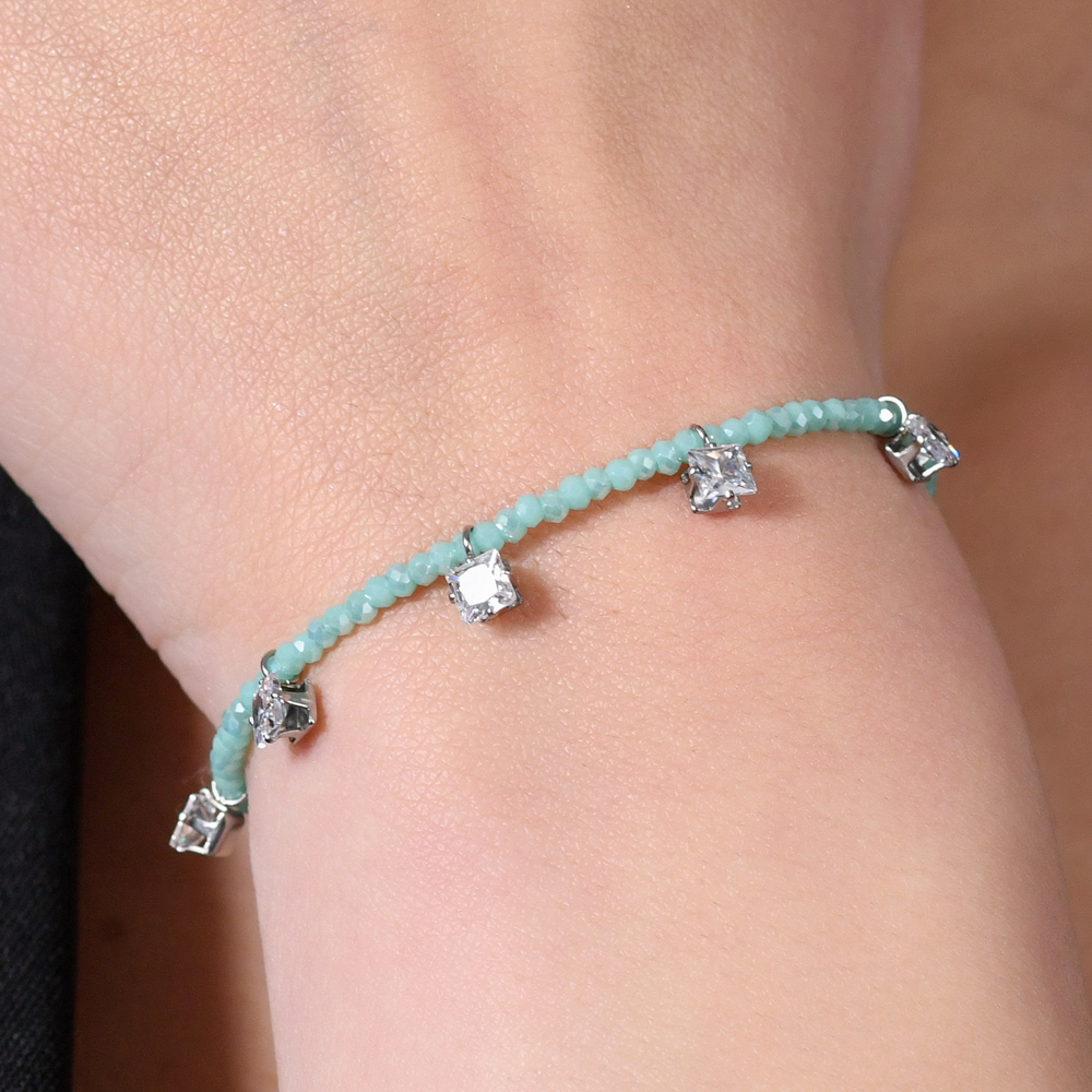 PULSERA DE ACERO PARA MUJER CON CRISTALES TURQUESA Y CIRCONITAS BLANCAS