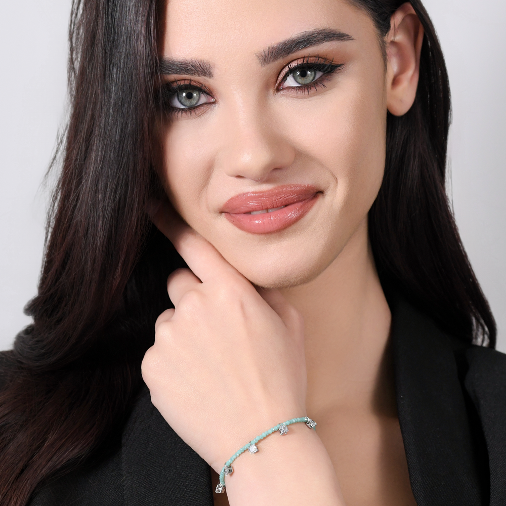 PULSERA DE ACERO PARA MUJER CON CRISTALES TURQUESA Y CIRCONITAS BLANCAS