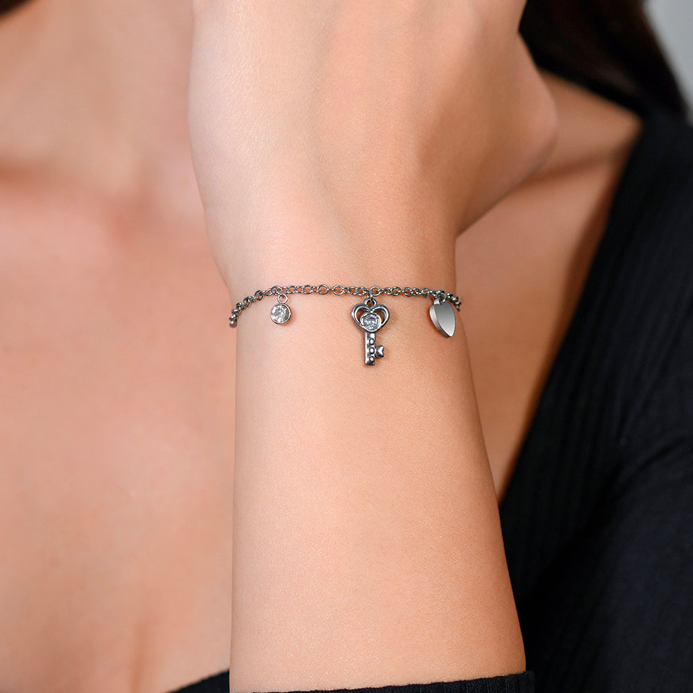 PULSERA DE ACERO CON LLAVE Y CORAZÓN PARA MUJER