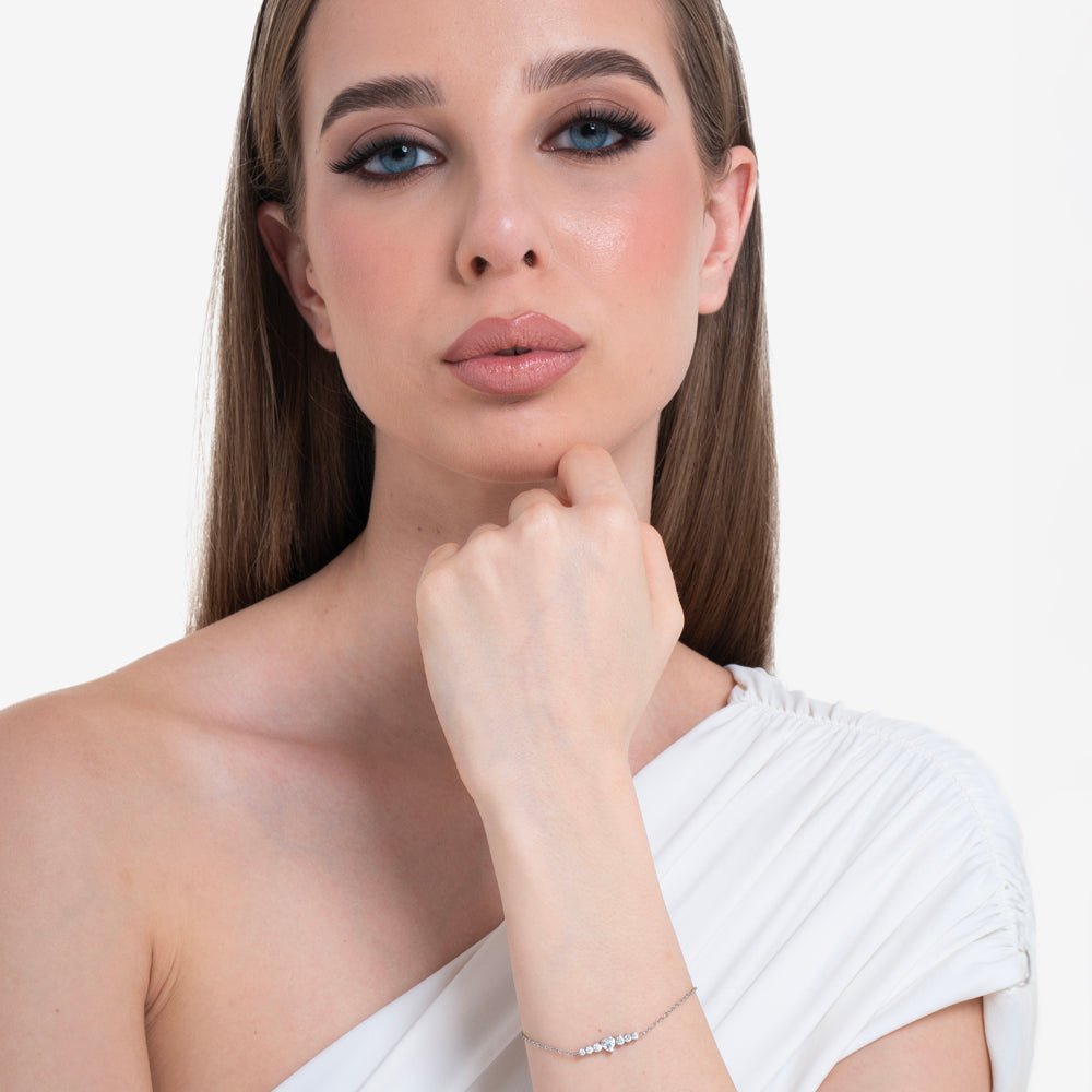 PULSERA DE ACERO PARA MUJER CON CORAZÓN Y CRISTALES BLANCOS