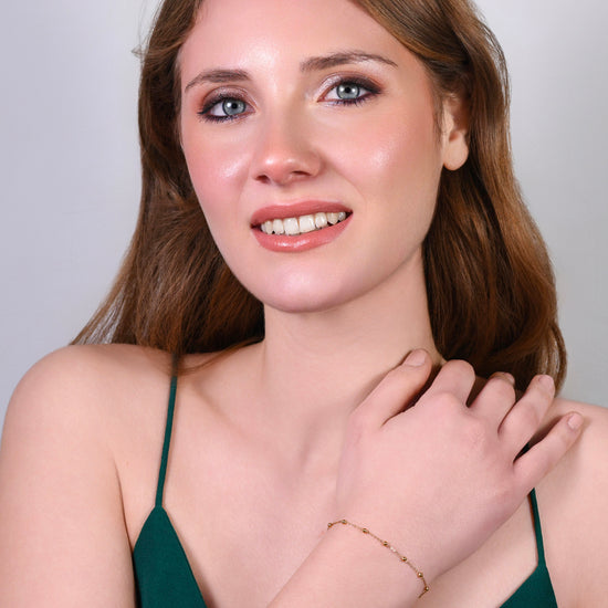 BRACCIALE DONNA IN ACCIAIO CON SFERE IP GOLD