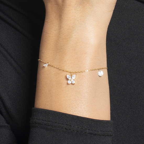 BRACCIALE DONNA IN ACCIAIO COLORE ORO CON PENDENTE FARFALLA ED ALI ZIRCONE BIANC