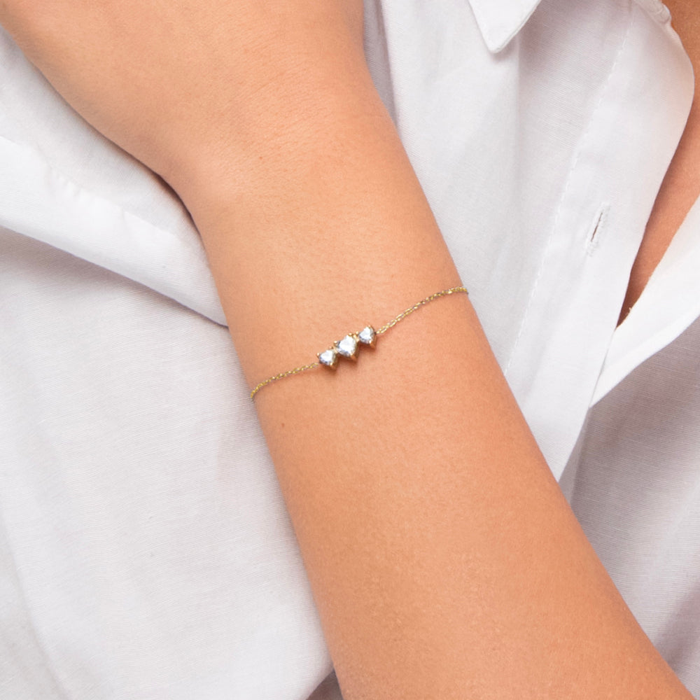 BRACCIALE DONNA IN ACCIAIO IP GOLD CON CUORI CON ZIRCONI BIANCHI