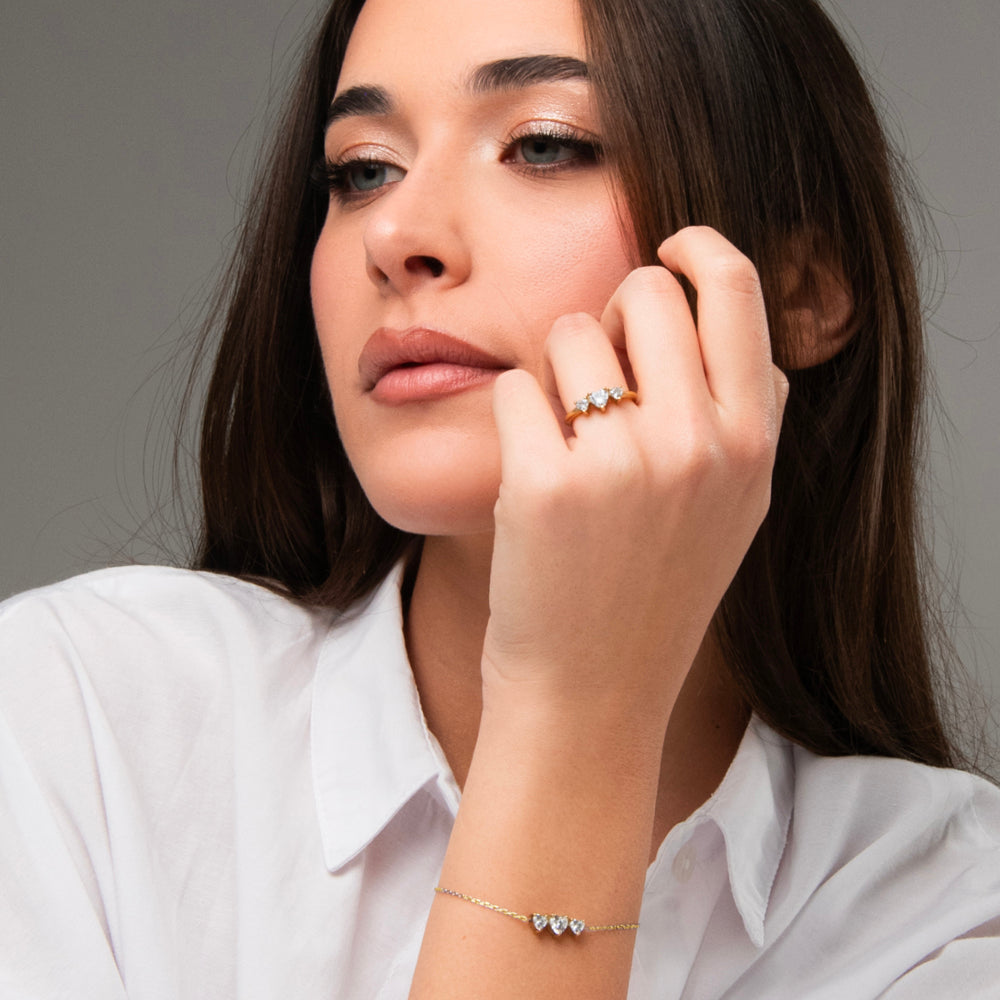 BRACCIALE DONNA IN ACCIAIO IP GOLD CON CUORI CON ZIRCONI BIANCHI