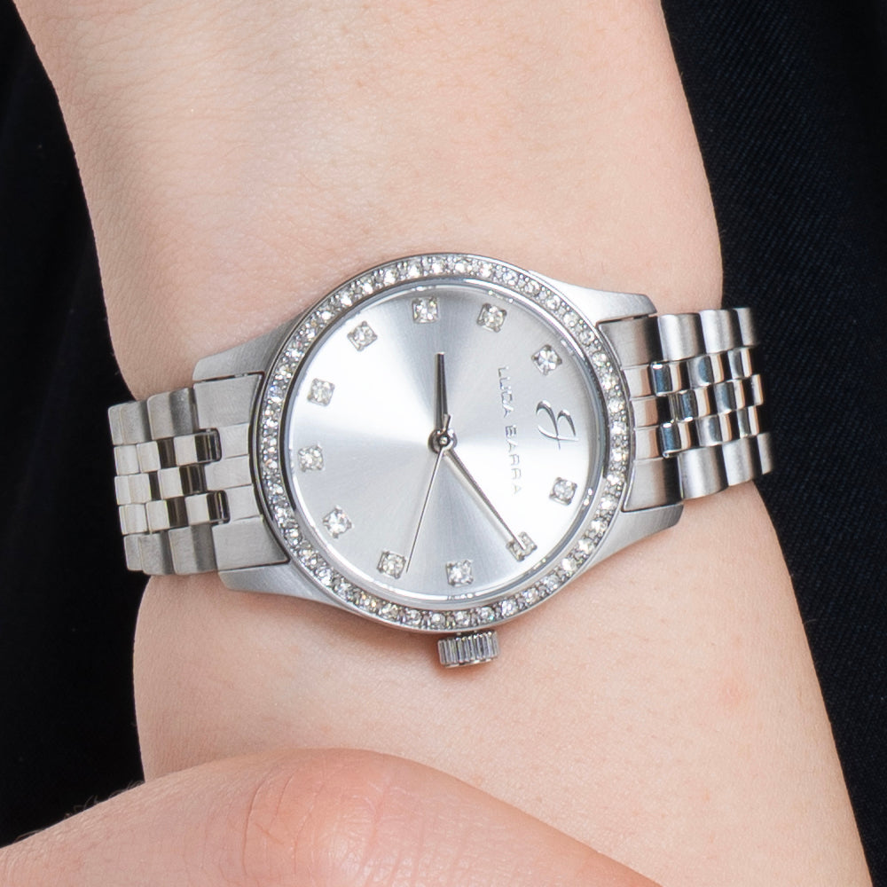 RELOJ DE ACERO PARA SEÑORA CON ESFERA PLATEADA Y BISEL DE CRISTAL BLANCO