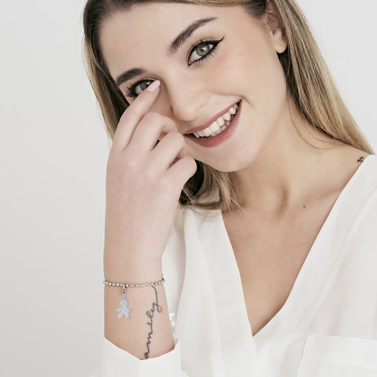 CHARM DE ACERO PARA BEBÉ CON CRISTALES BLANCOS