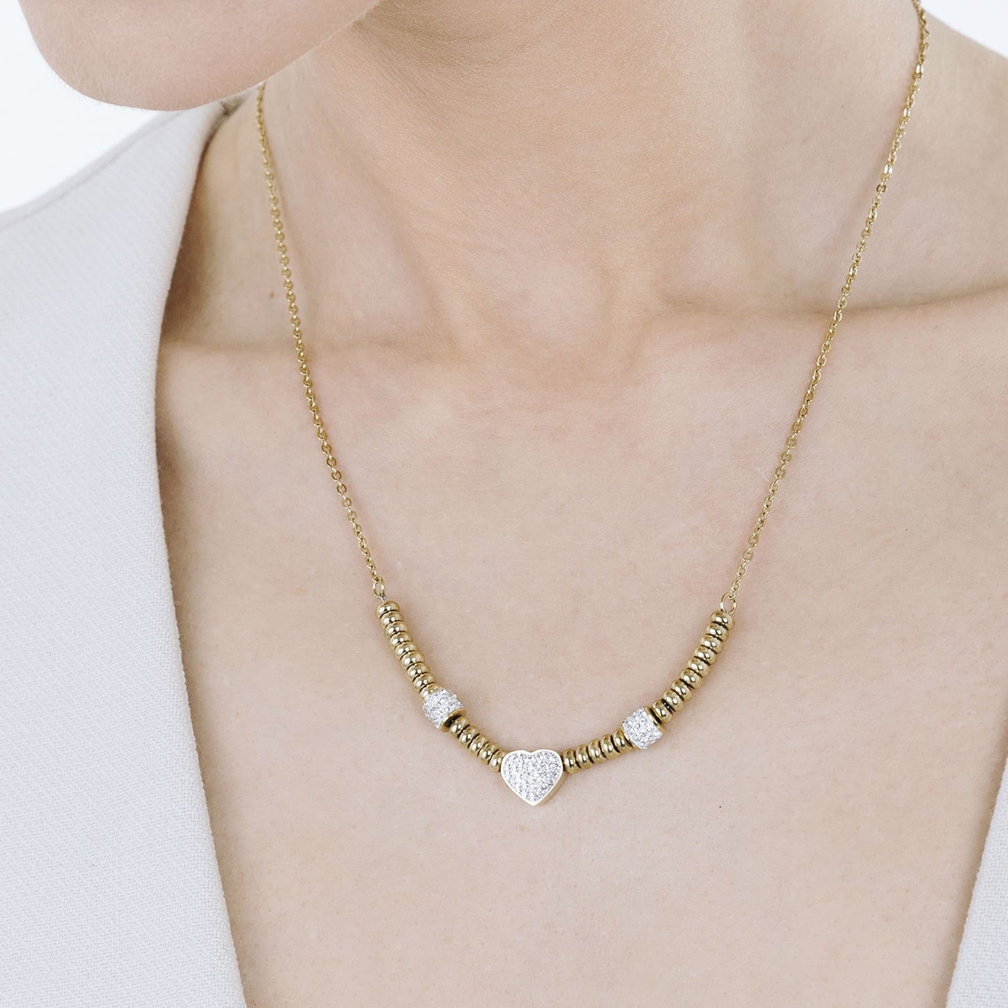 IP COLLAR DE ACERO DORADO CON CORAZÓN DE CRISTAL BLANCO