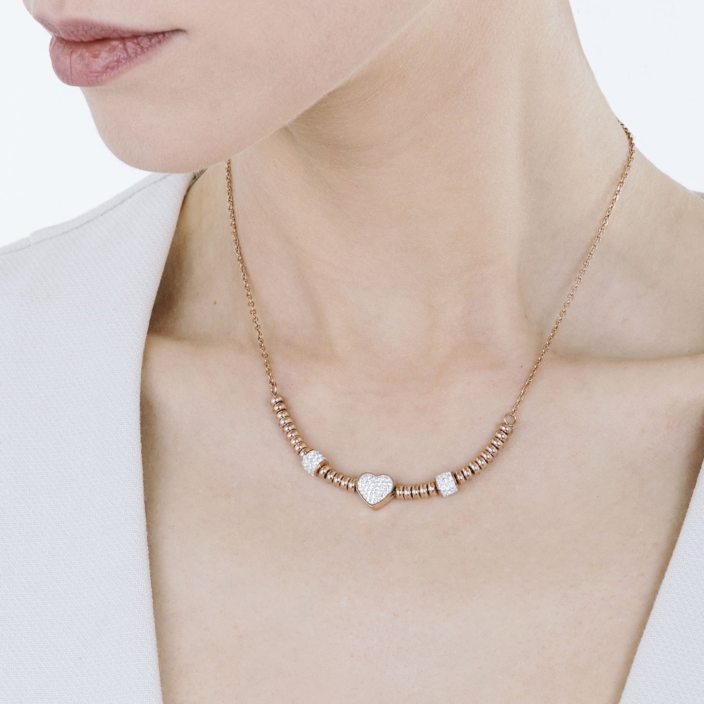COLLAR DE ACERO IP ROSA CON CORAZÓN CON CRISTALES BLANCOS