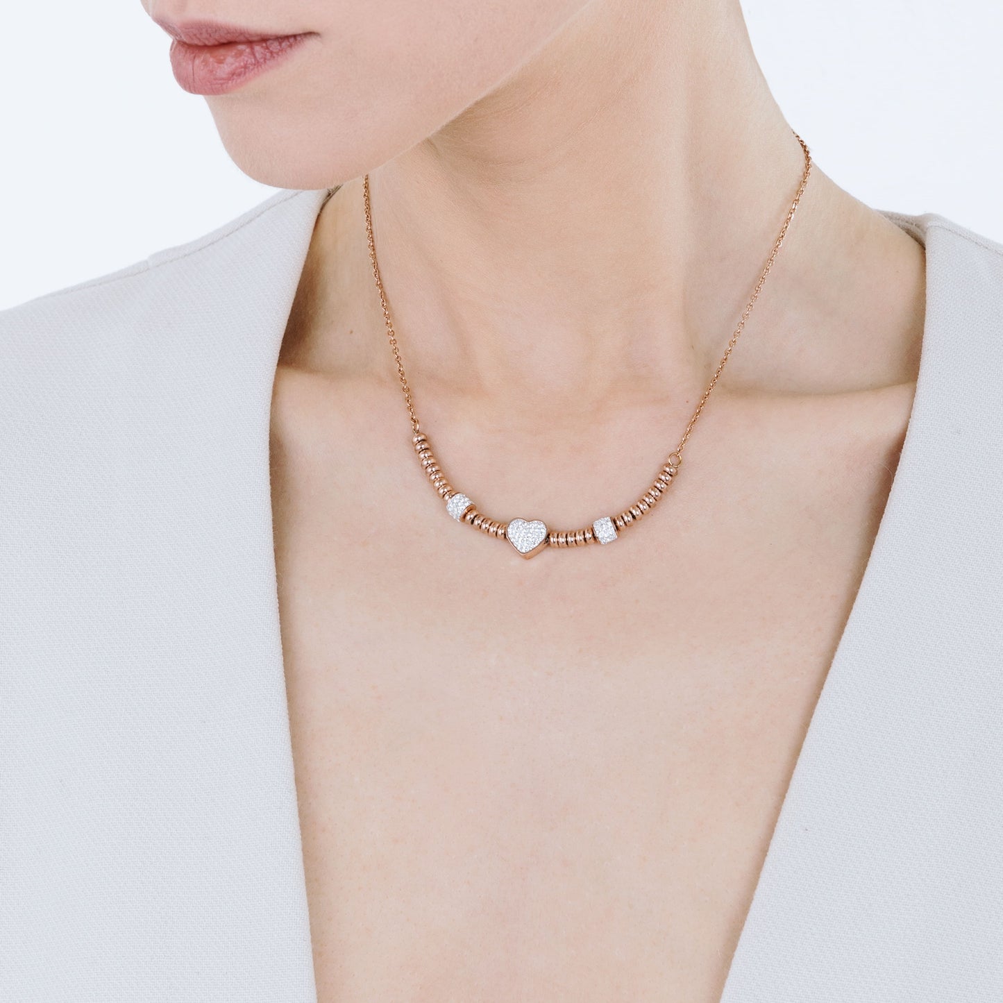 COLLAR DE ACERO IP ROSA CON CORAZÓN CON CRISTALES BLANCOS