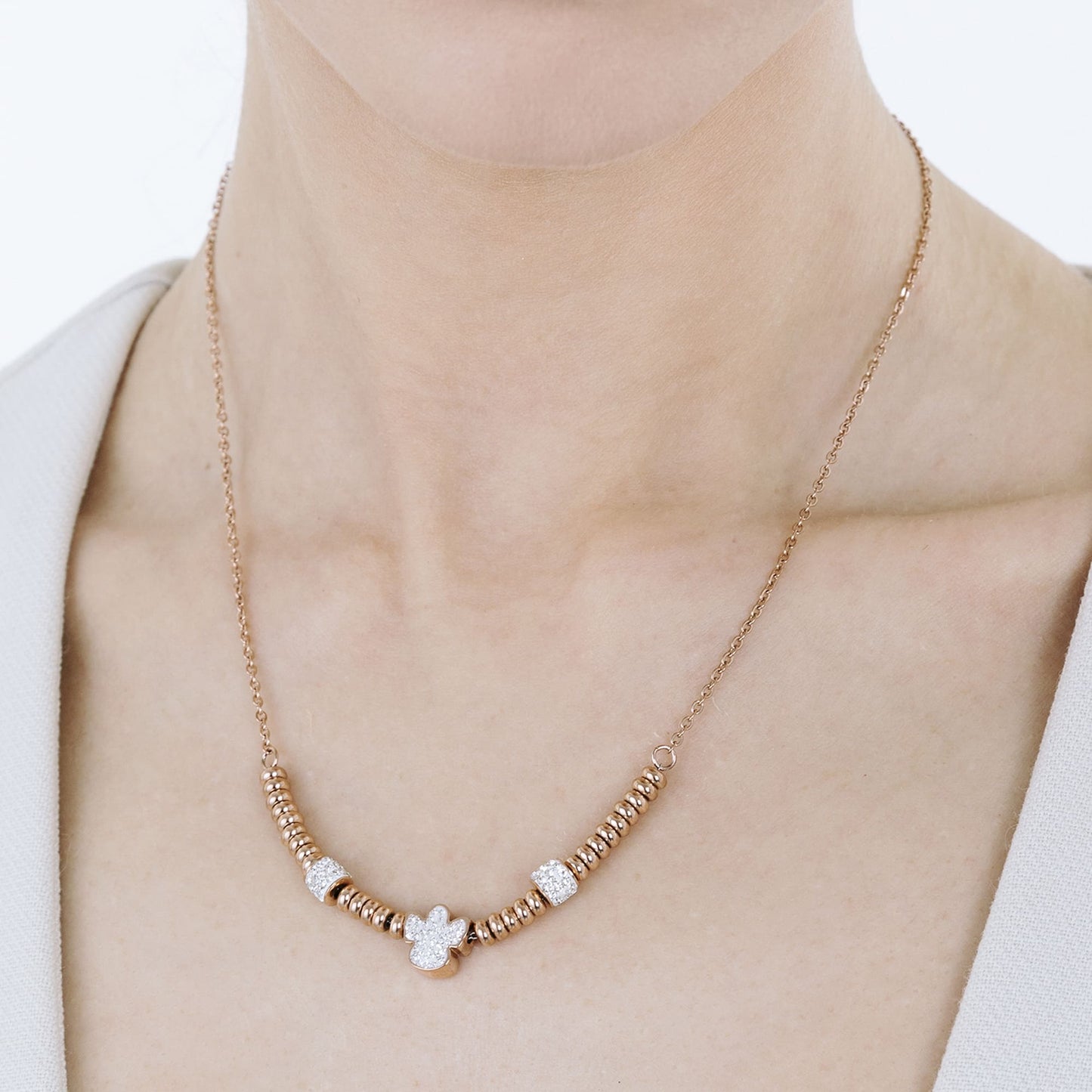 COLLAR DE ACERO IP ROSA CON ÁNGEL CON CRISTALES BLANCOS