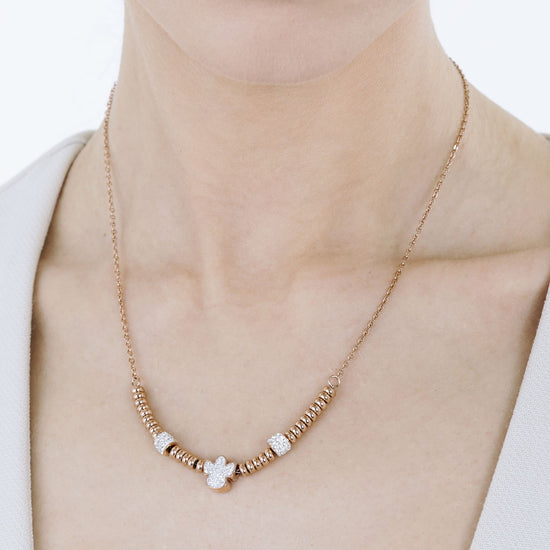 COLLAR DE ACERO IP ROSA CON ÁNGEL CON CRISTALES BLANCOS