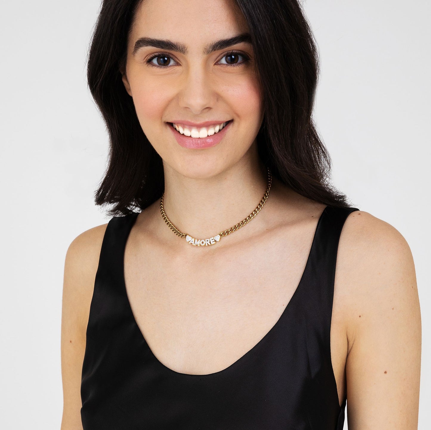 COLLAR DE AMOR DE ACERO DORADO CON CRISTALES BLANCOS