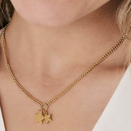 IP COLLAR DE ACERO DORADO PARA MUJER CON ESTRELLAS
