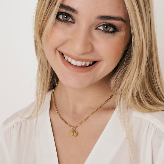 IP COLLAR DE ACERO DORADO PARA MUJER CON ESTRELLAS