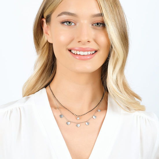 COLLAR DE ACERO PARA MUJER CON CORAZONES, ELEMENTOS IP NEGROS Y CRISTAL BLANCO